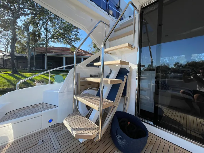  Yacht Photos Pics Staircase on 2017 Fairline Squadron 48 yacht with wooden deck and modern design.