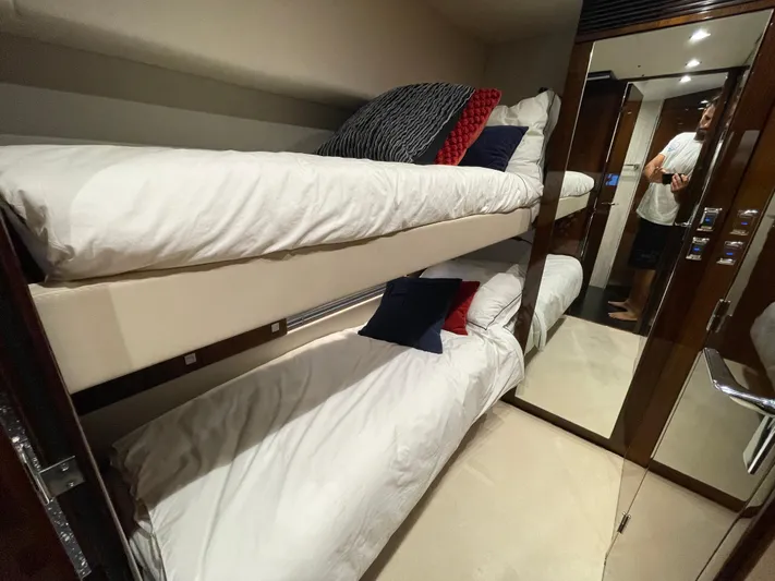  Yacht Photos Pics Bunk beds in 2017 Fairline Squadron 48 yacht cabin with mirrored closet.