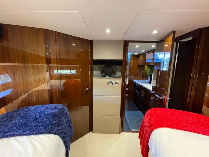  Yacht Photos Pics Luxurious interior of 2017 Fairline Squadron 48 yacht with modern design and cozy bedding.