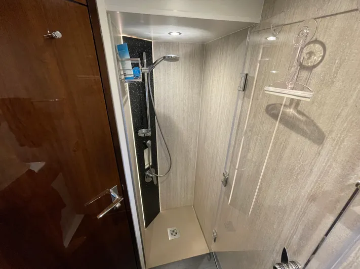  Yacht Photos Pics Shower area in 2017 Fairline Squadron 48 yacht, featuring modern fixtures and sleek design.