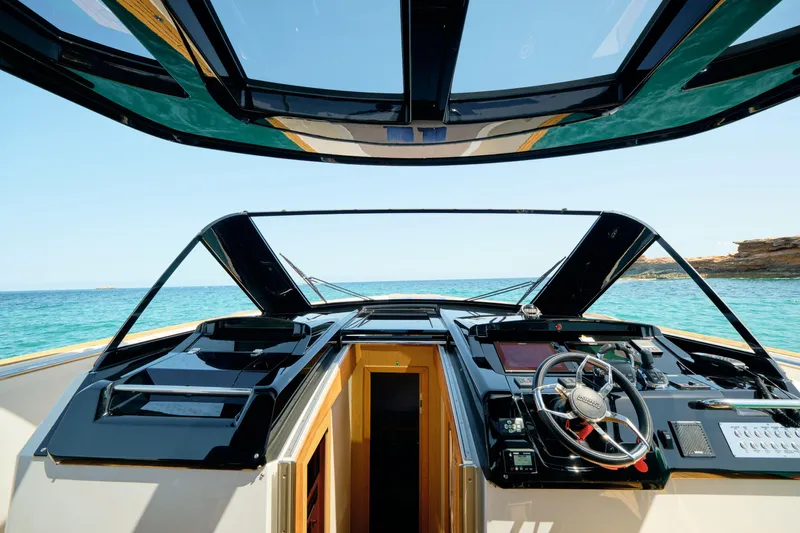 Yacht Photos Pics Cockpit view of 2018 Fjord 52 Open yacht with ocean backdrop.