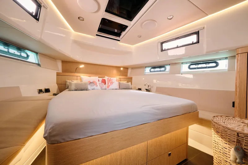 Yacht Photos Pics Luxurious cabin interior of 2018 Fjord 52 Open yacht with modern design and ambient lighting.