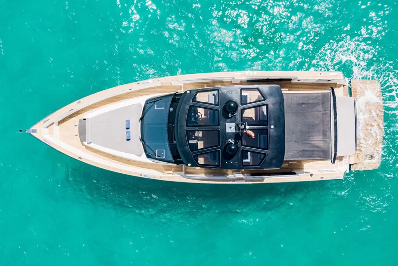  Yacht Photos Pics Aerial view of 2018 Fjord 52 Open yacht on turquoise water.