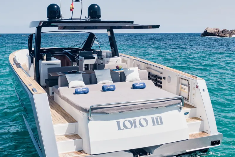  Yacht Photos Pics Luxurious 2018 Fjord 52 Open yacht on serene blue ocean waters.