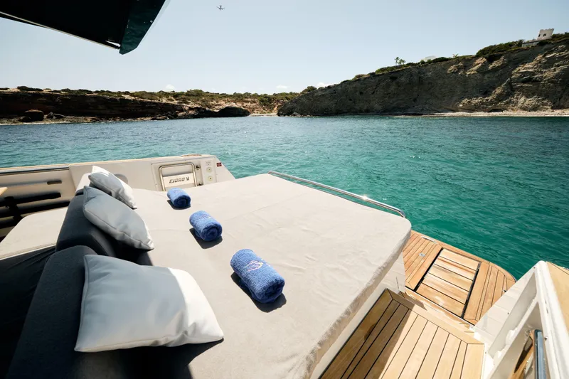  Yacht Photos Pics Luxurious 2018 Fjord 52 Open yacht with sunbathing area, scenic coastal view.