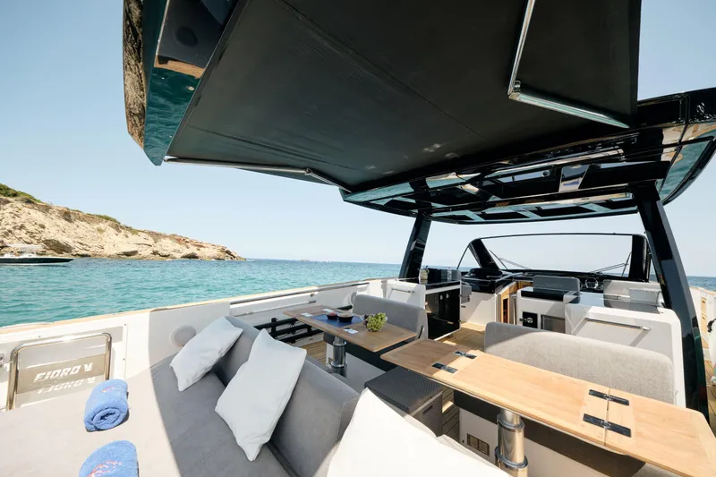  Yacht Photos Pics Luxurious 2018 Fjord 52 Open yacht interior with elegant seating and ocean view.