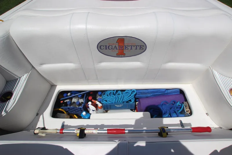  Yacht Photos Pics Storage compartment of a 2001 Cigarette 46 Rough Rider boat with ropes and equipment.
