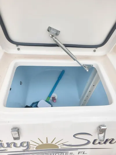 Rising Sun Yacht Photos Pics Open storage compartment on 2018 Grady-White Express 330 boat.