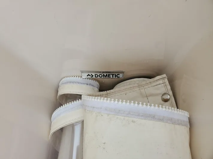 Rising Sun Yacht Photos Pics Dometic equipment in Grady-White Express 330 boat, 2018 model, with rolled canvas and zippers.