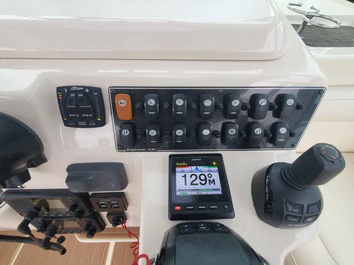 Rising Sun Yacht Photos Pics Control panel of a 2018 Grady-White Express 330 boat with navigation instruments.