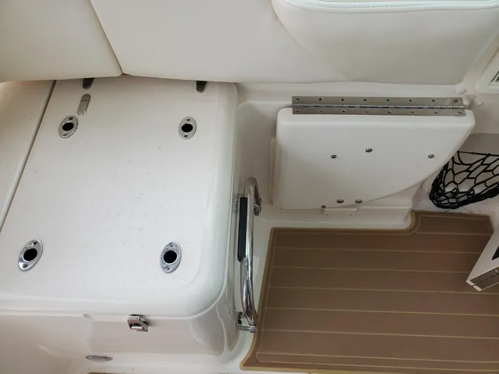 Rising Sun Yacht Photos Pics 2018 Grady-White Express 330 boat interior, featuring seating and storage compartments.