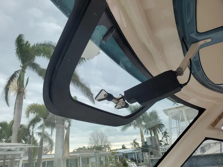 Rising Sun Yacht Photos Pics 2018 Grady-White Express 330 boat window with palm trees in the background.