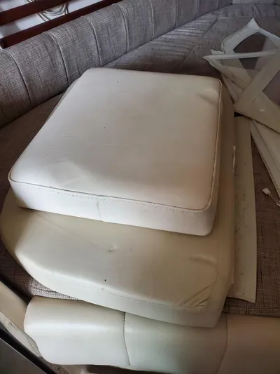 Rising Sun Yacht Photos Pics Cushions on a Grady-White Express 330 boat, 2018 model, with beige upholstery.