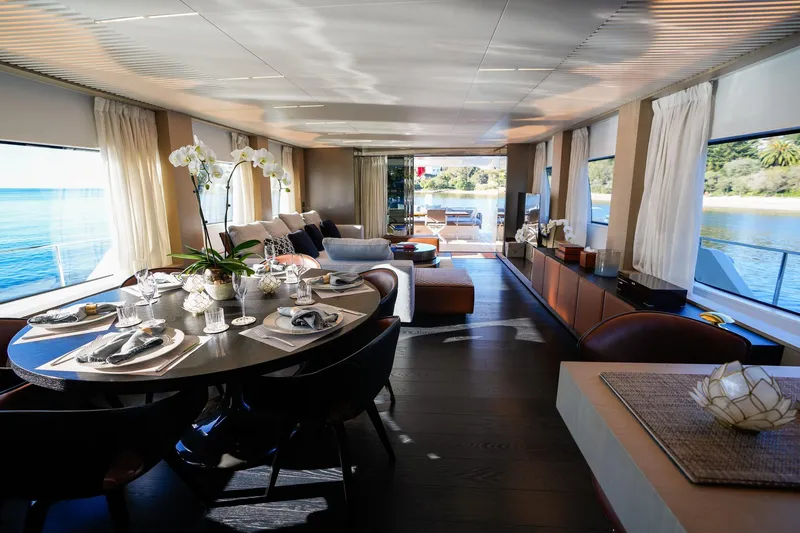 Toro Yacht Photos Pics Luxurious interior of 2017 Ferretti Yachts 850 with elegant dining and lounge area.