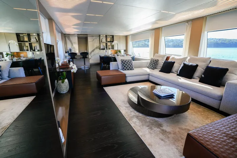 Toro Yacht Photos Pics Luxurious interior of 2017 Ferretti Yachts 850 with elegant seating and panoramic windows.