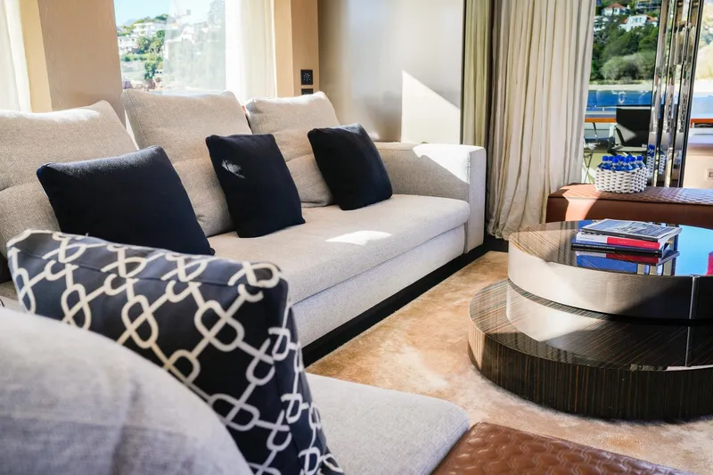 Toro Yacht Photos Pics Luxurious interior of 2017 Ferretti Yachts 850 with elegant sofa and modern decor.