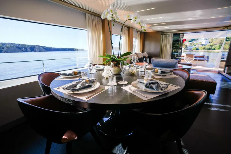 Toro Yacht Photos Pics Luxurious dining area on a 2017 Ferretti Yachts 850 with ocean view.