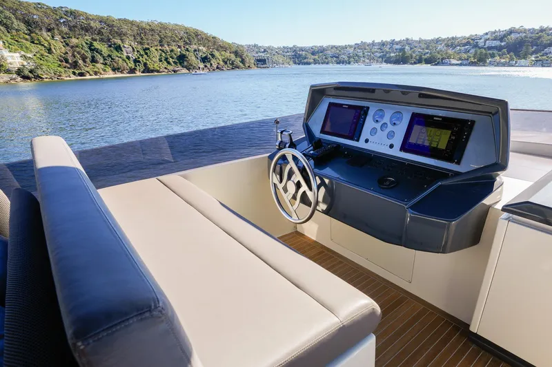 Toro Yacht Photos Pics Helm of 2017 Ferretti Yachts 850 with scenic water view.