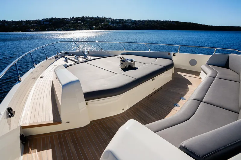 Toro Yacht Photos Pics Luxurious 2017 Ferretti Yachts 850 with spacious deck seating on serene water.