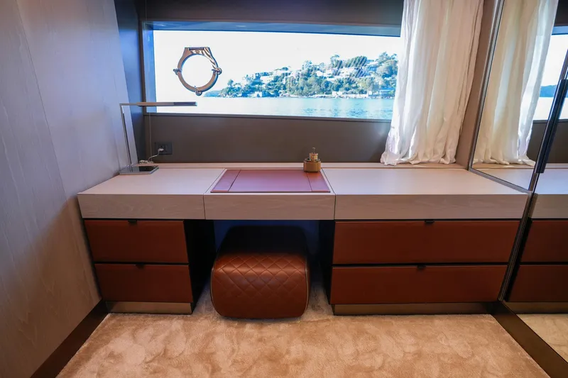 Toro Yacht Photos Pics Luxurious interior of 2017 Ferretti Yachts 850 with elegant desk and sea view.