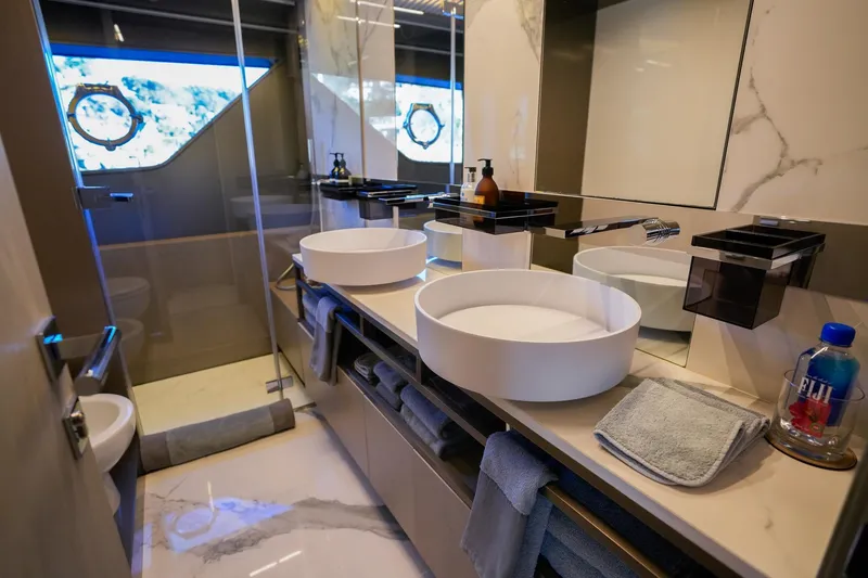 Toro Yacht Photos Pics Luxurious bathroom in a 2017 Ferretti Yachts 850, featuring modern fixtures and elegant design.
