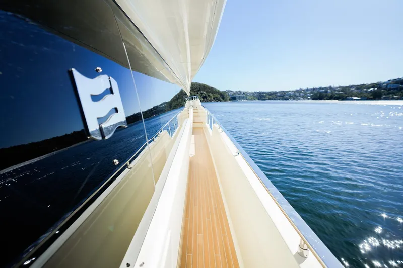 Toro Yacht Photos Pics Side view of 2017 Ferretti Yachts 850 on serene water, showcasing sleek design.