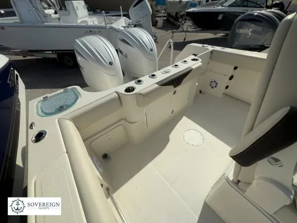  Yacht Photos Pics 2024 Sailfish 242 CC boat interior with Yamaha engines, spacious seating, and modern amenities.