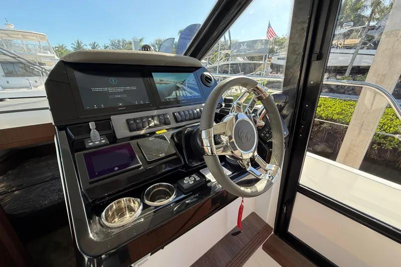  Yacht Photos Pics Helm of 2026 Beneteau Antares 12 with modern controls and steering wheel.