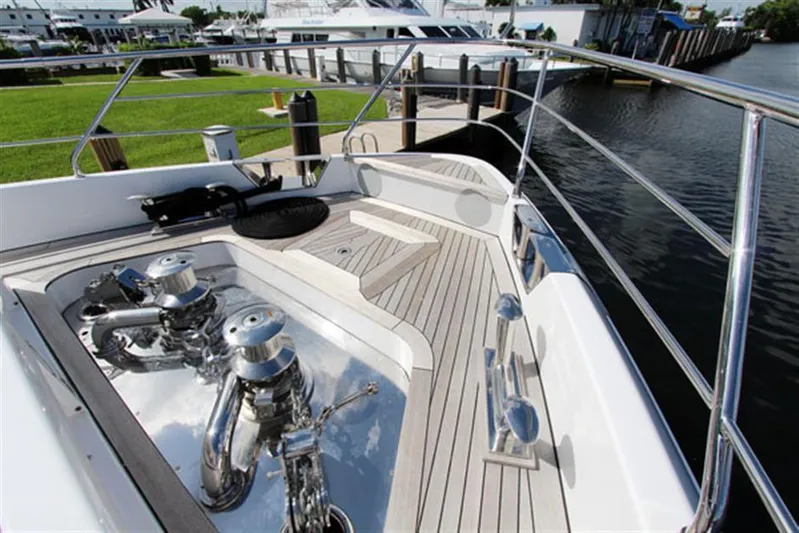 La Tache Yacht Photos Pics 2014 Azimut 100 Grande yacht deck with polished fittings and waterfront view.