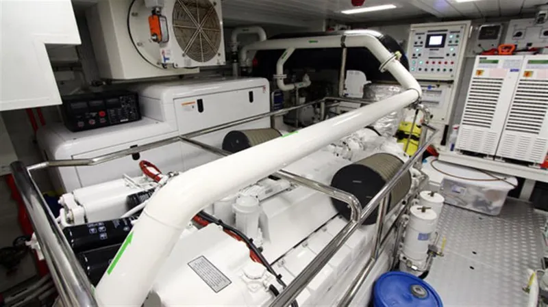 La Tache Yacht Photos Pics Engine room of a 2014 Azimut 100 Grande yacht with machinery and control panels.