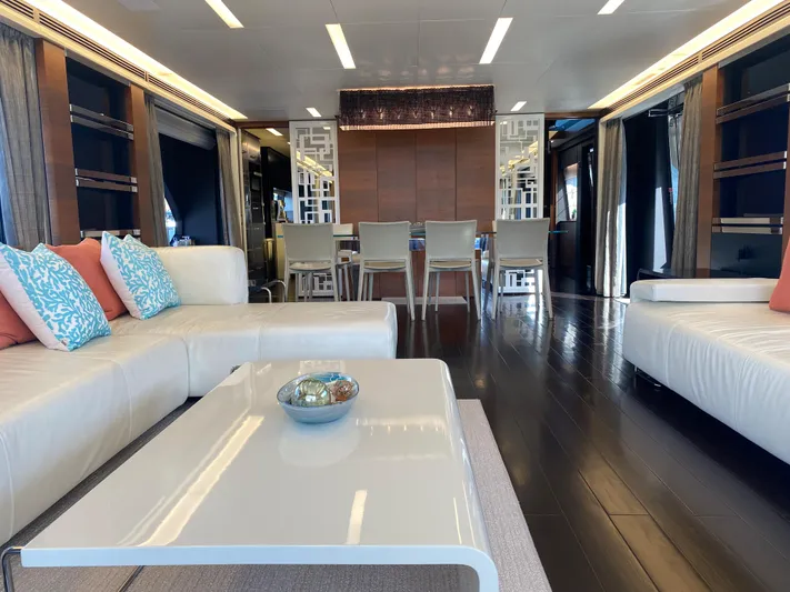 La Tache Yacht Photos Pics Luxurious interior of 2014 Azimut 100 Grande yacht with modern furnishings and elegant decor.