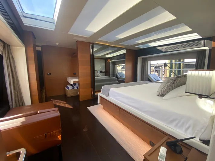 La Tache Yacht Photos Pics Luxurious bedroom interior of 2014 Azimut 100 Grande yacht with modern design and skylight.