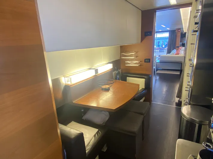 La Tache Yacht Photos Pics Interior dining area of 2014 Azimut 100 Grande yacht with modern furnishings.