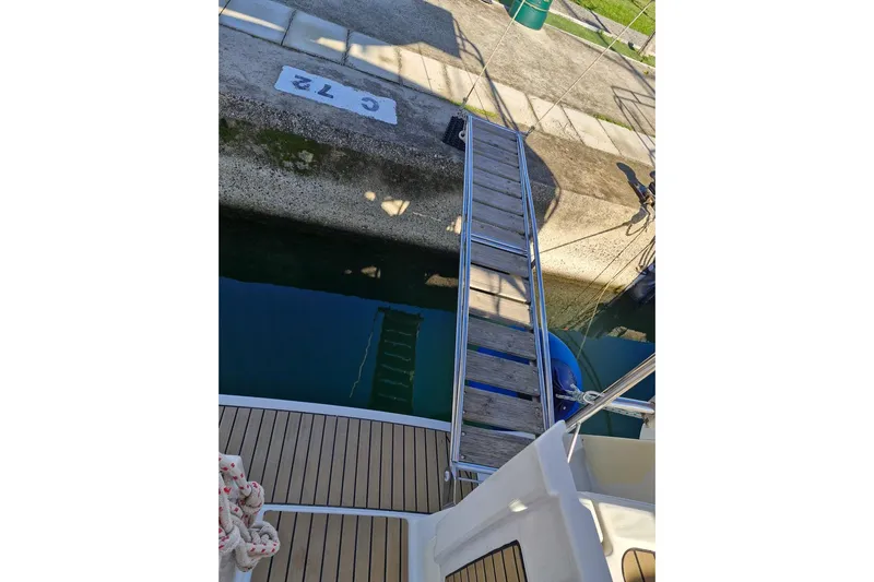  Yacht Photos Pics Boarding ramp on a 2007 Beneteau 46 yacht at dock C72.