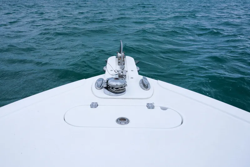  Yacht Photos Pics Bow of 2011 Yellowfin 32 Offshore boat on open water.