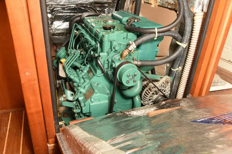 Makasi Yacht Photos Pics Engine compartment of a 2008 Tartan 4100 sailboat, featuring a green marine engine.