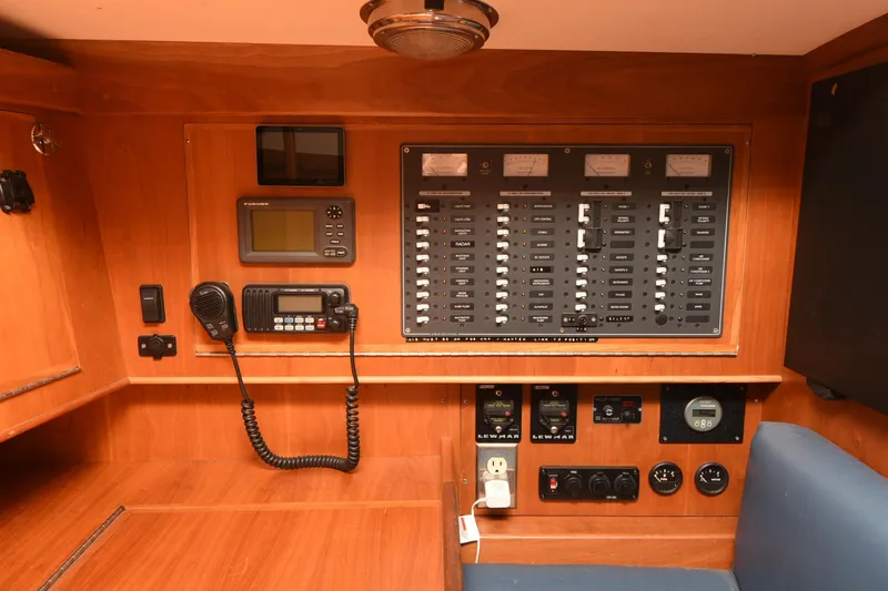 Makasi Yacht Photos Pics Control panel of a 2008 Tartan 4100 yacht with navigation and communication equipment.