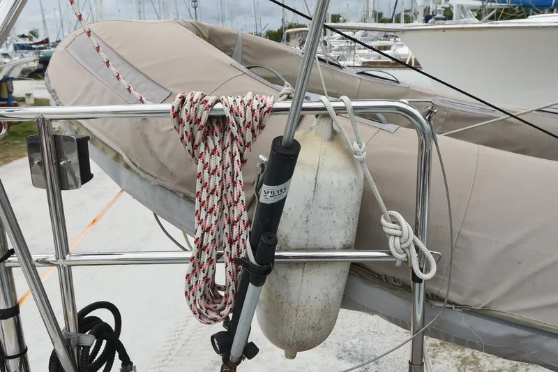 Makasi Yacht Photos Pics Tartan 4100 sailboat, 2008 model, with ropes and fender on deck railing.