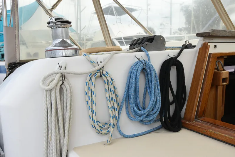 Makasi Yacht Photos Pics Coiled ropes on a 2008 Tartan 4100 sailboat deck, showcasing nautical equipment.