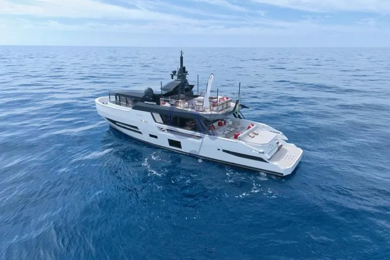L Yacht Photos Pics 2024 Arcadia Yachts Sherpa 80XL cruising on open sea under clear skies.