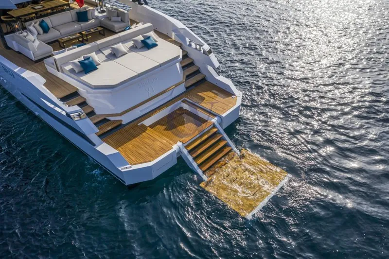 L Yacht Photos Pics Luxurious 2024 Arcadia Yachts Sherpa 80XL with elegant deck and ocean view.