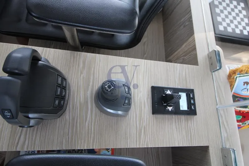 L Yacht Photos Pics Control panel of 2024 Arcadia Yachts Sherpa 80XL with joystick and throttle.