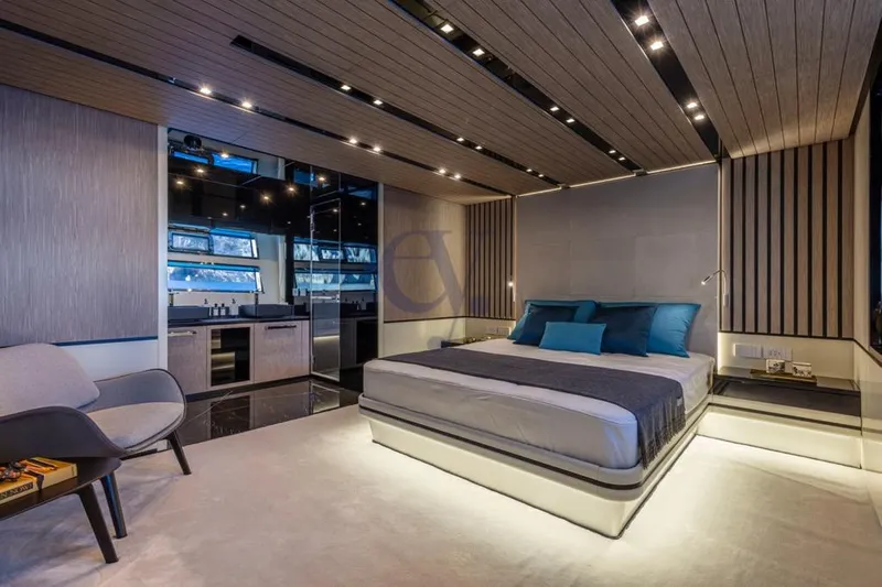 L Yacht Photos Pics Luxurious bedroom interior of 2024 Arcadia Yachts Sherpa 80XL with modern design and ambient lighting.
