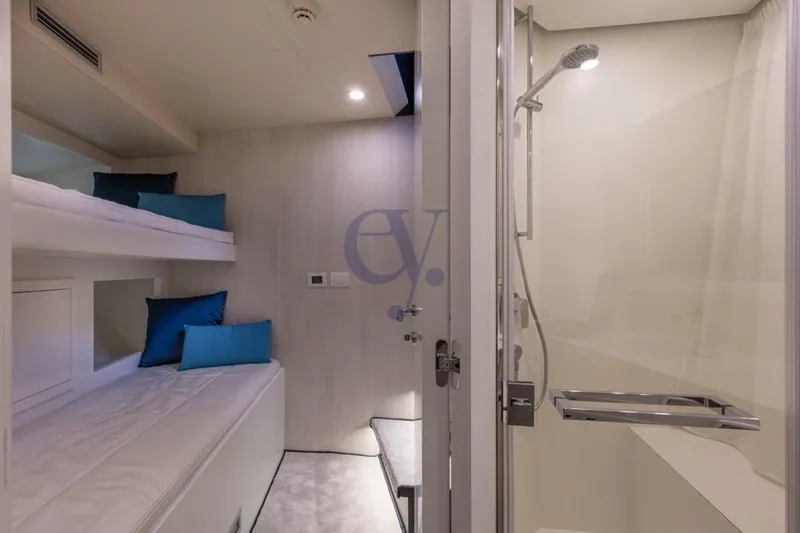 L Yacht Photos Pics Interior of 2024 Arcadia Yachts Sherpa 80XL with bunk beds and modern shower.