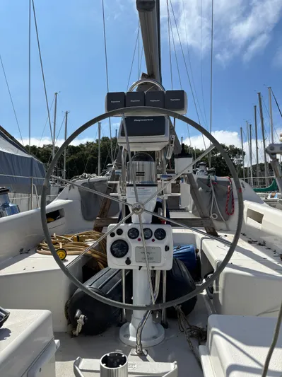 Renaissance Yacht Photos Pics Steering wheel of a 2000 Catalina 380 sailboat with navigation instruments.