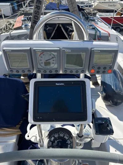 Renaissance Yacht Photos Pics Cockpit of 2000 Catalina 380 sailboat with Raytheon navigation instruments and compass.