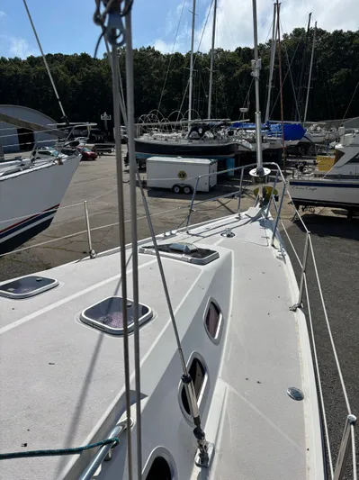 Renaissance Yacht Photos Pics Catalina 380 sailboat deck view in a marina, 2000 model.