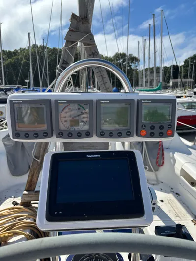 Renaissance Yacht Photos Pics Cockpit of 2000 Catalina 380 sailboat with Raytheon and Raymarine navigation instruments.