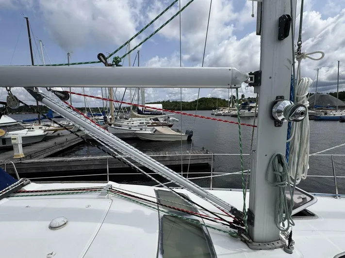  Yacht Photos Pics Sailboat Beneteau 373, 2006 model, docked at marina with rigging and cloudy sky.