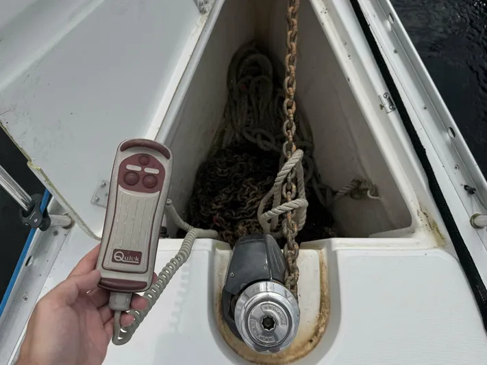  Yacht Photos Pics Remote control and anchor chain on a 2006 Beneteau 373 sailboat deck.